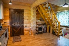 Фото проекта: Дом-баня из кедра в г. Серпухов Рубленная деревянная баня  "10х10,5" в диком стиле из бревна 360-380мм 